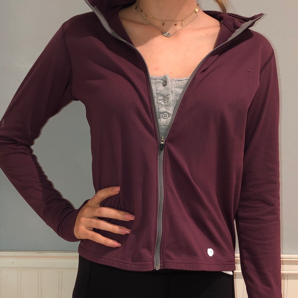 purple zip up athletic sweatshirt